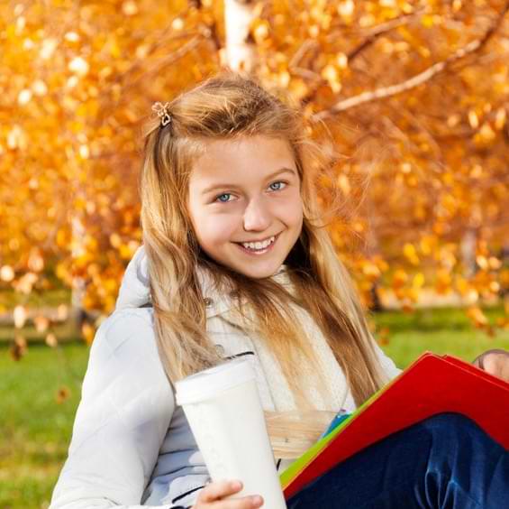 Aws Autumn Close Portrait Of Happy Girl With Long Hair Sitting On The Bench With Textbooks