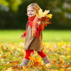 Aws Autumn Young Girl Smiling With Leaves In The Fall