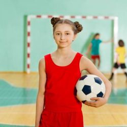 Girl In Red Gym Uniform Smiling